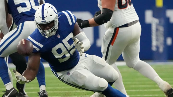 Indianapolis Colts defensive tackle Adetomiwa Adebawore (95) attempts and fails to recover a ball during the first half of a preseason game against the Denver Broncos on Sunday, Aug. 11, 2024, at Lucas Oil Stadium in Indianapolis. The Broncos defeated the Colts 34-30. Indianapolis Colts defensive tackle Adetomiwa Adebawore (95) attempts and fails to recover a ball during the first half of a preseason game against the Denver Broncos on Sunday, Aug. 11, 2024, at Lucas Oil Stadium in Indianapolis. The Broncos defeated the Colts 34-30.