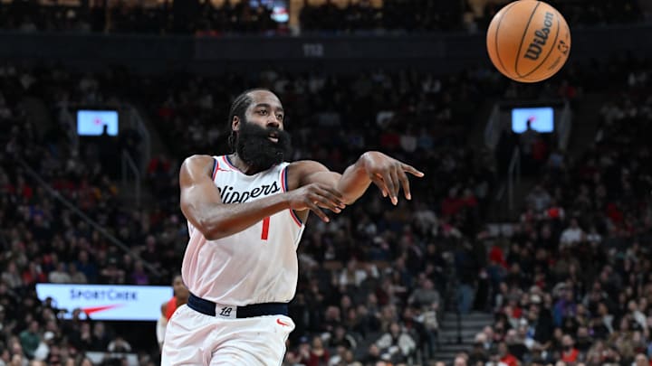 Feb 2, 2025; Toronto, Ontario, CAN; Los Angeles Clippers guard James Harden (1) passes the ball against the Toronto Raptors in the second half at Scotiabank Arena. Mandatory Credit: Dan Hamilton-Imagn Images