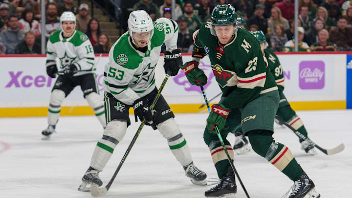 Nov 12, 2023; Saint Paul, Minnesota, USA; Minnesota Wild center Marco Rossi (23) shoots defended by