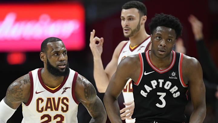 Apr 3, 2018; Cleveland, OH, USA; Toronto Raptors forward OG Anunoby (3) and Cleveland Cavaliers forward Larry Nance Jr. (22) react after a three-point basket by forward LeBron James (23) in the first quarter Quicken Loans Arena. Mandatory Credit: David Richard-Imagn Images