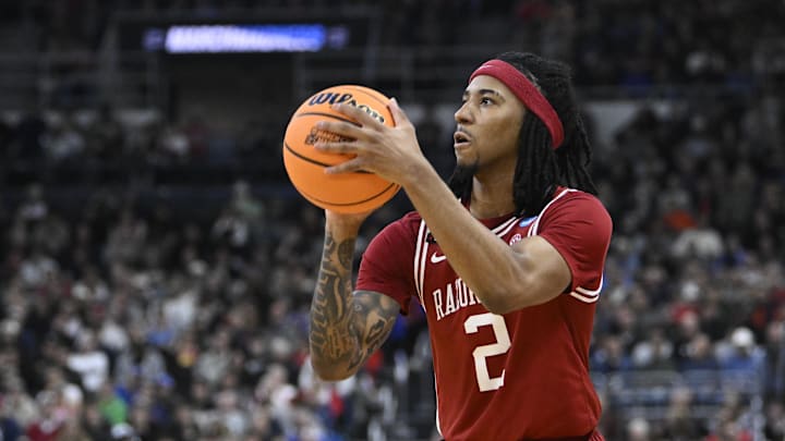 Mar 20, 2025; Providence, RI, USA;  Arkansas Razorbacks guard Boogie Fland (2) controls the ball during the second half against the Kansas Jayhawks at Amica Mutual Pavilion. Mandatory Credit: Eric Canha-Imagn Images