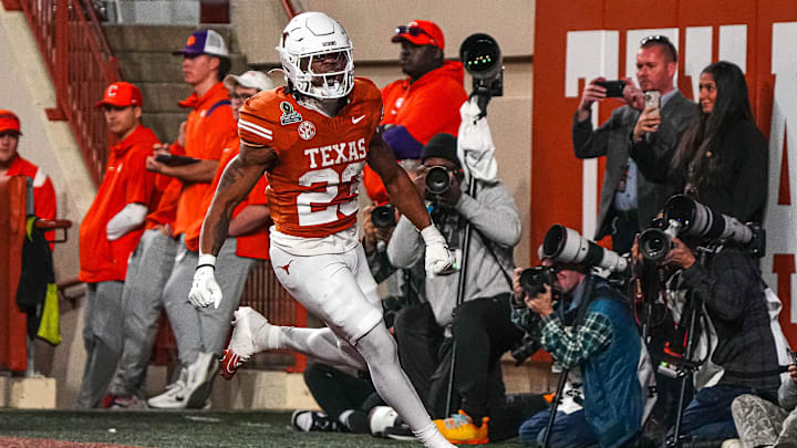 Dec 21, 2024; Austin, Texas, USA; Texas Longhorns running back Jaydon Blue (23) celebrates after running for a touchdown against the Clemson Tigers in the first round of the College Football Playoffs at Darrell K Royal-Texas Memorial Stadium. Mandatory Credit: Aaron E. Martinez/USA Today Network via Imagn Images