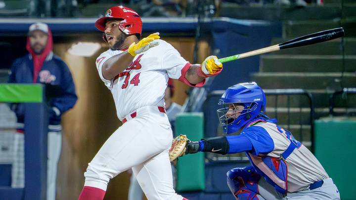 Peoria catcher Rainiel Rodriguez watches his hit leave the infield for a base hit against South Bend during the Chiefs' home opener Tuesday, April 7, 2026 at Dozer Park. The Chiefs routed the Cubs 10-1. Peoria catcher Rainiel Rodriguez watches his hit leave the infield for a base hit against South Bend during the Chiefs' home opener Tuesday, April 7, 2026 at Dozer Park. The Chiefs routed the Cubs 10-1.