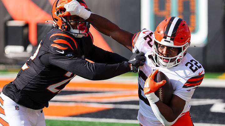 Jan 4, 2026; Cincinnati, Ohio, USA; Cincinnati Bengals safety Geno Stone (22, left) tackles Cleveland Browns running back Dylan Sampson (22, right) following a reception by Sampson during the first quarter at Paycor Stadium. Mandatory Credit: Joseph Maiorana-Imagn Images Jan 4, 2026; Cincinnati, Ohio, USA; Cincinnati Bengals safety Geno Stone (22, left) tackles Cleveland Browns running back Dylan Sampson (22, right) following a reception by Sampson during the first quarter at Paycor Stadium. Mandatory Credit: Joseph Maiorana-Imagn Images