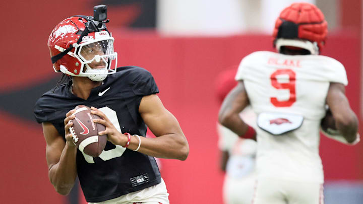 Aug 14, 2025; Fayetteville, AR, USA; Arkansas Razorbacks quarterback Taylen Green (10) drops back to pass during practice. Mandatory Credit: Nelson Chenault-Imagn Images
