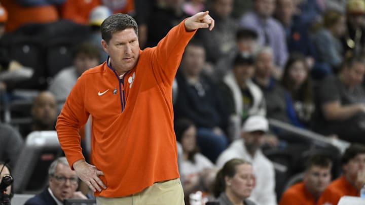Mar 20, 2025; Providence, RI, USA; Clemson Tigers head coach Brad Brownell signals to his players during the first half against the McNeese State Cowboys at Amica Mutual Pavilion. Mandatory Credit: Eric Canha-Imagn Images
