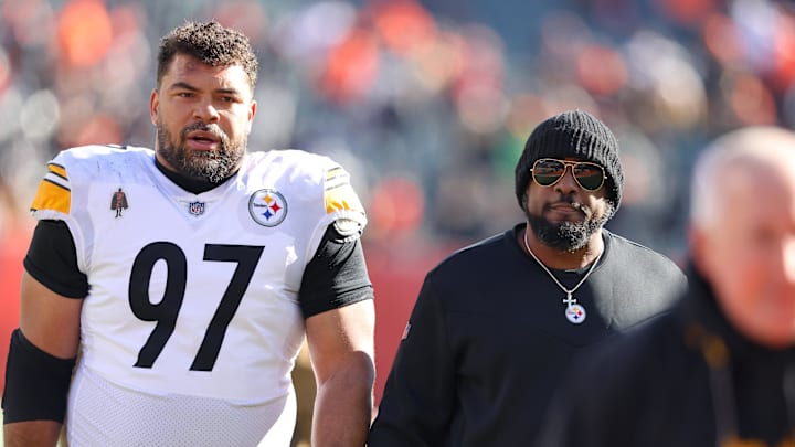Dec 1, 2024; Cincinnati, Ohio, USA;  Pittsburgh Steelers defensive tackle Cameron Heyward (97) and head coach Mike Tomlin before the game against the Cincinnati Bengals at Paycor Stadium. Mandatory Credit: Joseph Maiorana-Imagn Images