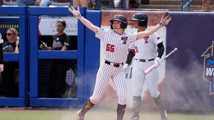 Texas Tech Kaitlyn Terry (55) celebrates after scoring a run in the fifth inning as Texas Tech gets a run-rule victory during a Women's College World Series softball game between the Texas Tech Red Raiders and the Mississippi State Bulldogs at Devon Park in Oklahoma City, Thursday, May 28, 2026. Texas Tech won 8-0.