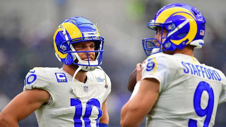Sep 18, 2022; Inglewood, California, USA; Los Angeles Rams wide receiver Cooper Kupp (10) speaks with quarterback Matthew Stafford (9) before playing against the Atlanta Falcons at SoFi Stadium.