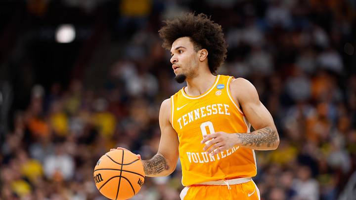 Mar 29, 2026; Chicago, IL, USA; Tennessee Volunteers guard Ja'Kobi Gillespie (0) drives the ball in the first half against the Michigan Wolverines during an Elite Eight game of the Midwest Regional of the men's 2026 NCAA Tournament at United Center. Mandatory Credit: Kamil Krzaczynski-Imagn Images