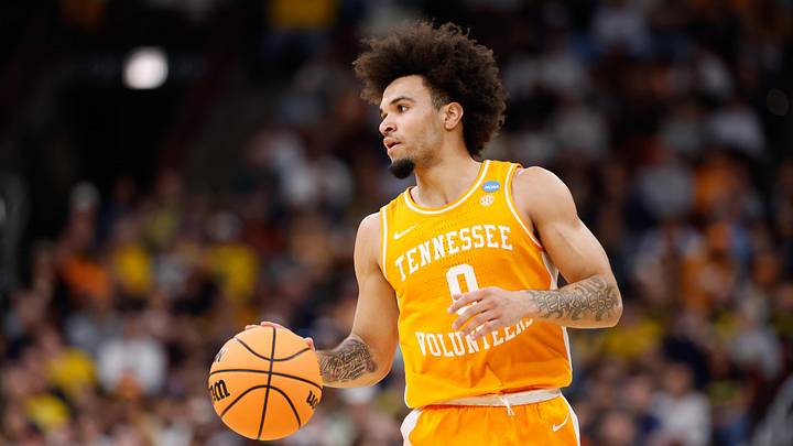 Mar 29, 2026; Chicago, IL, USA; Tennessee Volunteers guard Ja'Kobi Gillespie (0) drives the ball in the first half against the Michigan Wolverines during an Elite Eight game of the Midwest Regional of the men's 2026 NCAA Tournament at United Center. Mandatory Credit: Kamil Krzaczynski-Imagn Images