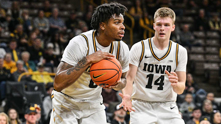Iowa Hawkeyes guard Tavion Banks (6) and guard Bennett Stirtz (14) 