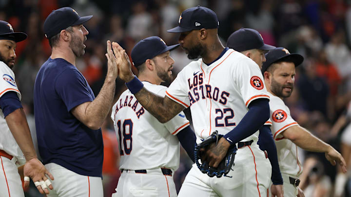 Sep 21, 2024; Houston, Texas, USA; Houston Astros starting pitcher Justin Verlander and right fielder Jason Heyward celebrate.