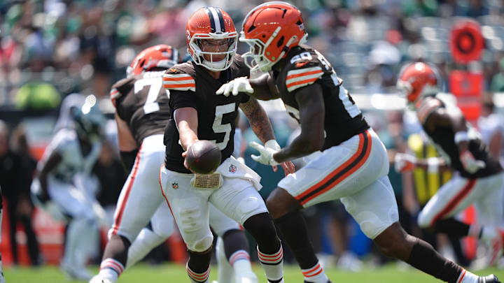 Aug 16, 2025; Philadelphia, Pennsylvania, USA; Cleveland Browns quarterback Dillon Gabriel (5) hands the ball to running back Pierre Strong Jr (20) against the Philadelphia Eagles in the first half at Lincoln Financial Field. Mandatory Credit: Kyle Ross-Imagn Images