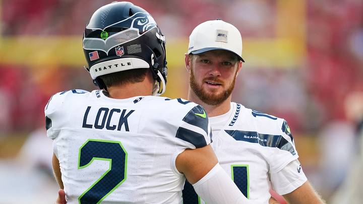 Aug 28, 2026; Kansas City, Missouri, USA; Seattle Seahawks quarterback Sam Darnold (14) talks with quarterback Drew Lock (2) prior to a game against the Kansas City Chiefs at Arrowhead Stadium. Mandatory Credit: Jay Biggerstaff-Imagn Images