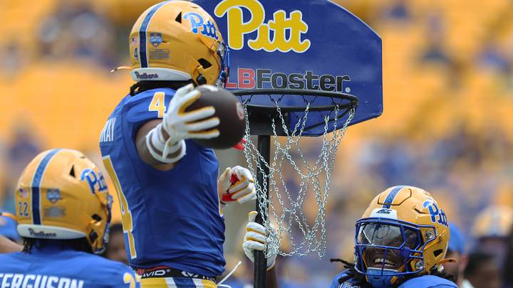 Sep 5, 2026; Pittsburgh, Pennsylvania, USA; Pittsburgh Panthers defensive back Rashan Murray (4) dunks the football in a basketball hoop after an interception against the Miami (OH) RedHawks during the fourth quarter at Acrisure Stadium. Mandatory Credit: Charles LeClaire-Imagn Images Sep 5, 2026; Pittsburgh, Pennsylvania, USA; Pittsburgh Panthers defensive back Rashan Murray (4) dunks the football in a basketball hoop after an interception against the Miami (OH) RedHawks during the fourth quarter at Acrisure Stadium. Mandatory Credit: Charles LeClaire-Imagn Images