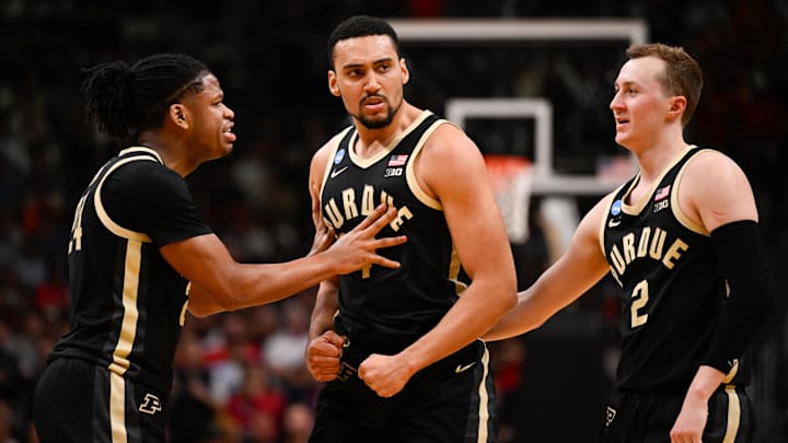 Purdue Boilermakers guard Gicarri Harris (24), forward Trey Kaufman-Renn (4) and guard Fletcher Loyer (2) react.