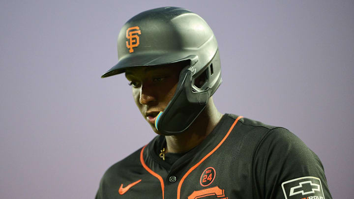 Sep 14, 2024; San Francisco, California, USA; San Francisco Giants infielder Marco Luciano (37) reacts after striking out against the San Diego Padres during the fifth inning at Oracle Park. Mandatory Credit: Robert Edwards-Imagn Images