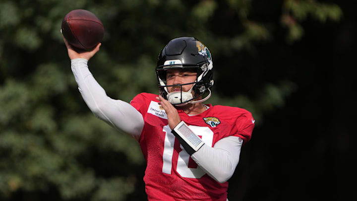Oct 17, 2024; Watford, United Kingdom; Jacksonville Jaguars quarterback John Rhys Plumlee (18) throws the ball during practice at The Grove. Mandatory Credit: Kirby Lee-Imagn Images