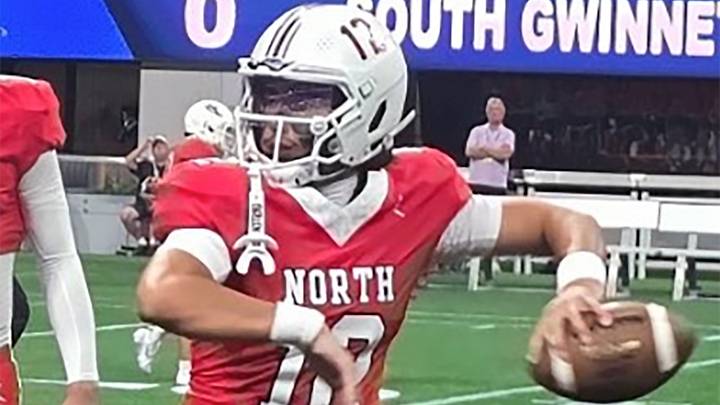 North Gwinnett quarterback Elam Rahman was a perfect 7-for-7 for 142 yards and three touchdowns in leading the Bulldogs to a 34-22 win over Grayson.