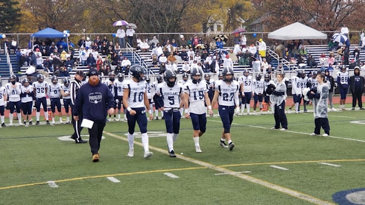 Portland Bulldogs walking up at the 2023 Maine high school football state championships. 