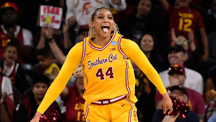 Mar 24, 2025; Los Angeles, California, USA; USC Trojans forward Kiki Iriafen (44) celebrates scoring in the third quarter against the Mississippi State Bulldogs during an NCAA Tournament second round game at Galen Center. Mandatory Credit: Robert Hanashiro-Imagn Images