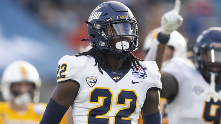 Dec 30, 2023; Tucson, AZ, USA; Toledo Rockets safety Emmanuel McNeil-Warren (22) against the Wyoming Cowboys in the Arizona Bowl at Arizona Stadium. Mandatory Credit: Mark J. Rebilas-USA TODAY Sports