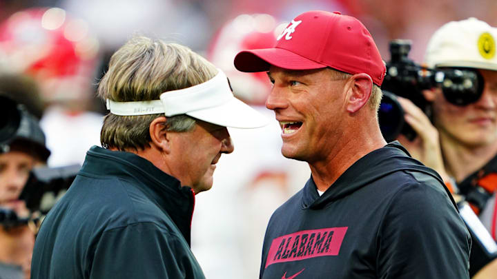 Sep 28, 2024; Tuscaloosa, Alabama, USA; Georgia Bulldogs head coach Kirby Smart and Alabama Crimson Tide head coach Kalen DeBoer greet each other before the game at Bryant-Denny Stadium. Mandatory Credit: John David Mercer-Imagn Images Sep 28, 2024; Tuscaloosa, Alabama, USA; Georgia Bulldogs head coach Kirby Smart and Alabama Crimson Tide head coach Kalen DeBoer greet each other before the game at Bryant-Denny Stadium. Mandatory Credit: John David Mercer-Imagn Images
