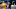 Predators' mascot Gnash standing between two fans as someone in a jersey with his name takes a photo. Predators' mascot Gnash standing between two fans as someone in a jersey with his name takes a photo.