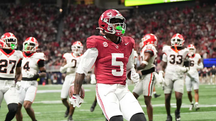 Dec 6, 2025; Atlanta, GA, USA; Alabama Crimson Tide wide receiver Germie Bernard (5) scores a touchdown during the fourth quarter against the Georgia Bulldogs during the 2025 SEC Championship game at Mercedes-Benz Stadium. Mandatory Credit: Dale Zanine-Imagn Images