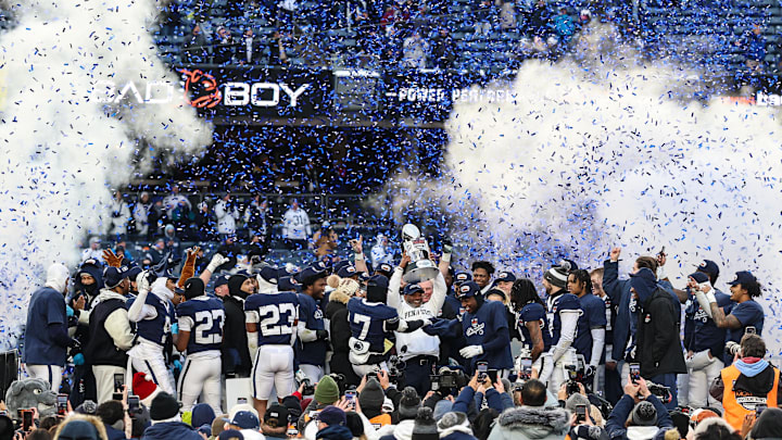 Penn State Nittany Lions interim head coach Terry Smith holds up the George M. Steinbrenner Trophy with his team after the 2025 Pinstripe Bowl against the Clemson Tigers Penn State Nittany Lions interim head coach Terry Smith holds up the George M. Steinbrenner Trophy with his team after the 2025 Pinstripe Bowl against the Clemson Tigers