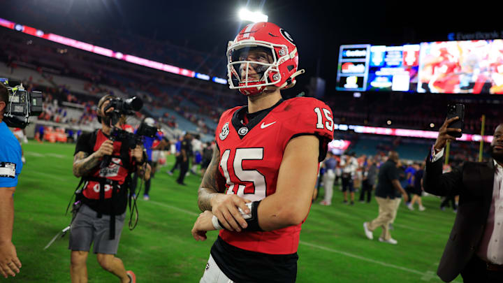 Georgia Bulldogs quarterback Carson Beck (15) walks off the field after the game of an NCAA college football matchup Saturday, Nov. 2, 2024 at EverBank Stadium in Jacksonville, Fla. The Georgia Bulldogs defeated the Florida Gators 34-20.