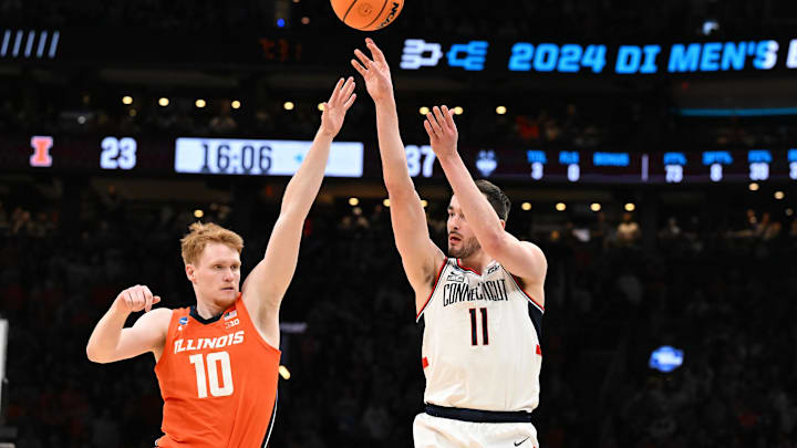 Mar 30, 2024; Boston, MA, USA; Connecticut Huskies forward Alex Karaban (11) shoots the ball against the Illinois Fighting Illini in the finals of the East Regional of the 2024 NCAA Tournament at TD Garden. Mandatory Credit: Brian Fluharty-Imagn Images