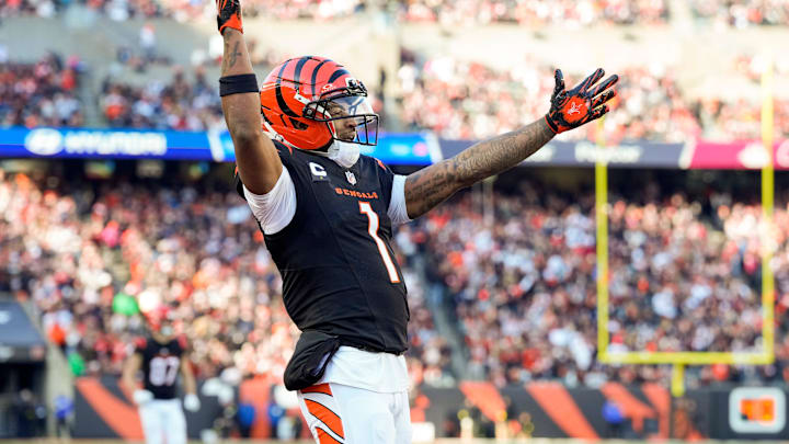 Cincinnati Bengals wide receiver Ja'marr Chase (1) celebrates a touchdown by Tee Higgins in the second quarter of the NFL Week 18 game between the Cincinnati Bengals and the Cleveland Browns at Paycor Stadium in Downtown Cincinnati on Sunday, Jan. 4, 2026.