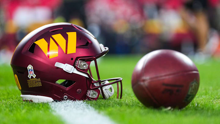 Washington Commanders helmet on the field at Northwest Stadium Washington Commanders helmet on the field at Northwest Stadium