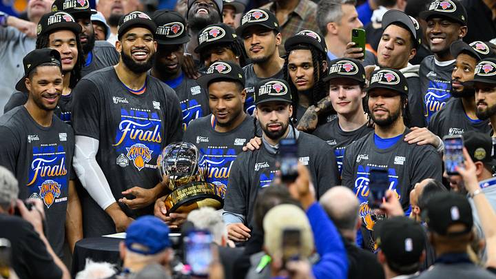 May 25, 2026; Cleveland, Ohio, USA; New York Knicks pose with the 2026 Eastern Conference trophy after defeating the Cleveland Cavaliers in game four May 25, 2026; Cleveland, Ohio, USA; New York Knicks pose with the 2026 Eastern Conference trophy after defeating the Cleveland Cavaliers in game four
