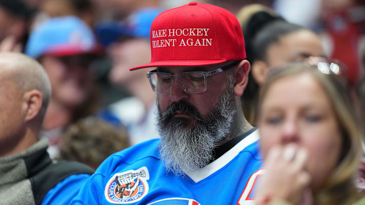 Nov 29, 2025; Denver, Colorado, USA; Colorado Avalanche fan during the third period against the Montreal Canadiens at Ball Arena. Mandatory Credit: Ron Chenoy-Imagn Images