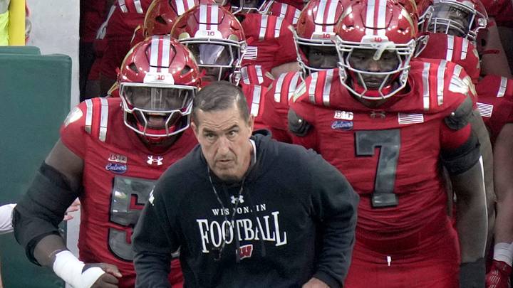 Wisconsin head coach Luke Fickell leads his team on to the field before their game against Notre Dame Sunday, September 6, 2026 at Lambeau Field in Green Bay, Wisconsin.