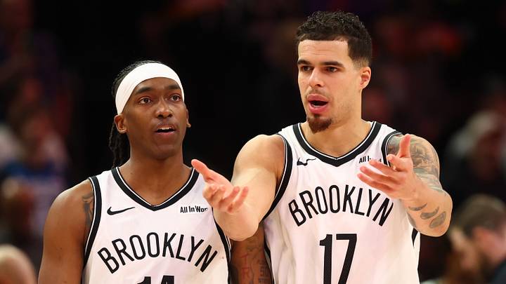 Jan 27, 2026; Phoenix, Arizona, USA; Brooklyn Nets forward Michael Porter Jr. (17) and guard Terance Mann (14) against the Phoenix Suns at Mortgage Matchup Center. Mandatory Credit: Mark J. Rebilas-Imagn Images