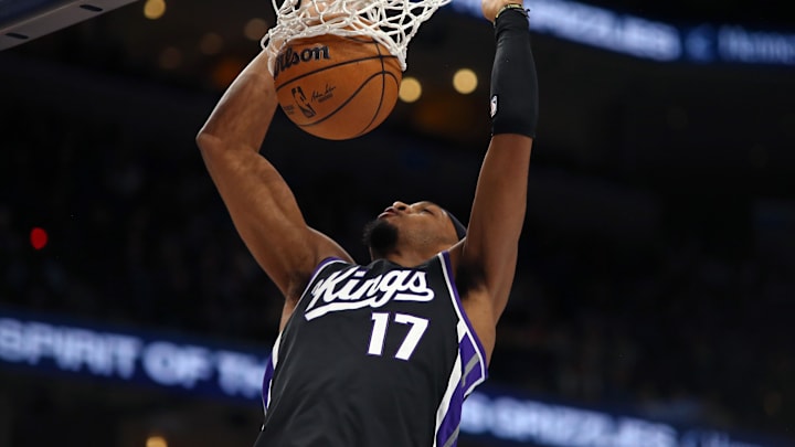 Dec 5, 2024; Memphis, Tennessee, USA; Sacramento Kings center Isaac Jones (17) dunks during the fourth quarter against the Memphis Grizzlies at FedExForum. Mandatory Credit: Petre Thomas-Imagn Images Dec 5, 2024; Memphis, Tennessee, USA; Sacramento Kings center Isaac Jones (17) dunks during the fourth quarter against the Memphis Grizzlies at FedExForum. Mandatory Credit: Petre Thomas-Imagn Images
