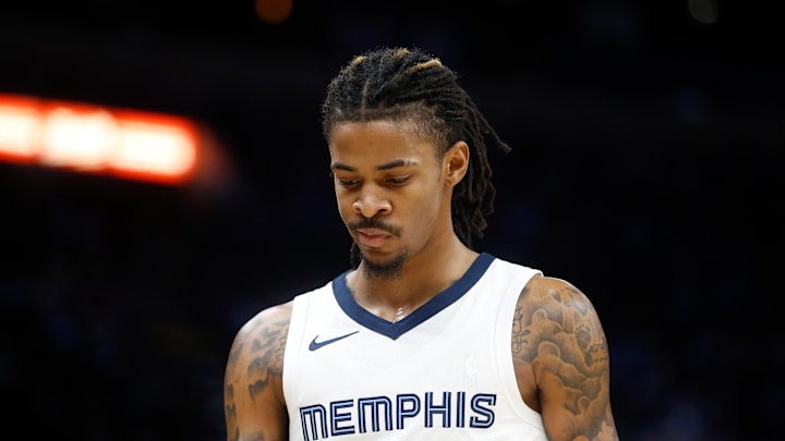 Dec 31, 2023; Memphis, Tennessee, USA; Memphis Grizzlies guard Ja Morant (12) reacts during the second half against the Sacramento Kings at FedExForum. 