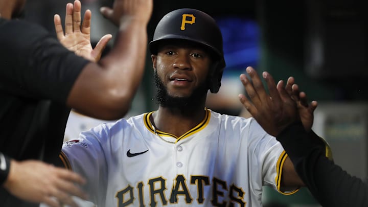 Sep 24, 2024; Pittsburgh, Pennsylvania, USA; Pittsburgh Pirates right fielder Bryan De La Cruz (41) celebrates with teammates in the dugout after scoring a run against the Milwaukee Brewers  during the second inning at PNC Park. Mandatory Credit: Charles LeClaire-Imagn Images