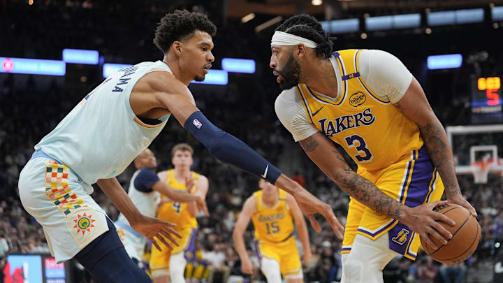 Nov 27, 2024; San Antonio, Texas, USA; Los Angeles Lakers forward Anthony Davis (3) faces off against San Antonio Spurs center Victor Wembanyama (1) in the second half at Frost Bank Center.