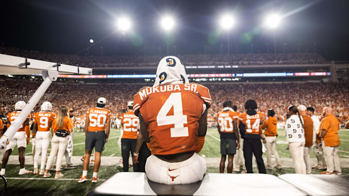 Oct 19, 2024; Austin, Texas, USA; Texas Longhorns corner back Andrew Mukuba (4) watching the game in the fourth quarter against the Georgia Bulldogs at Darrell K Royal-Texas Memorial Stadium. Mandatory Credit: Brett Patzke-Imagn Images Oct 19, 2024; Austin, Texas, USA; Texas Longhorns corner back Andrew Mukuba (4) watching the game in the fourth quarter against the Georgia Bulldogs at Darrell K Royal-Texas Memorial Stadium. Mandatory Credit: Brett Patzke-Imagn Images
