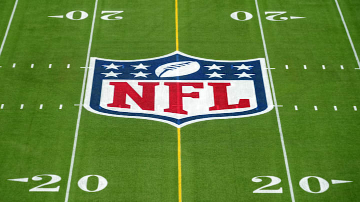 Feb 1, 2025; Orlando, FL, USA; An overall view of the NFL shield logo at midfield on the Camping World Stadium flag football field. Mandatory Credit: Kirby Lee-Imagn Images