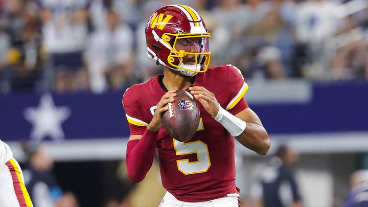 Washington Commanders quarterback Jayden Daniels (5) throws during the game against the Dallas Cowboys at AT&T Stadium. Mandatory Credit: Kevin Jairaj-Imagn Images