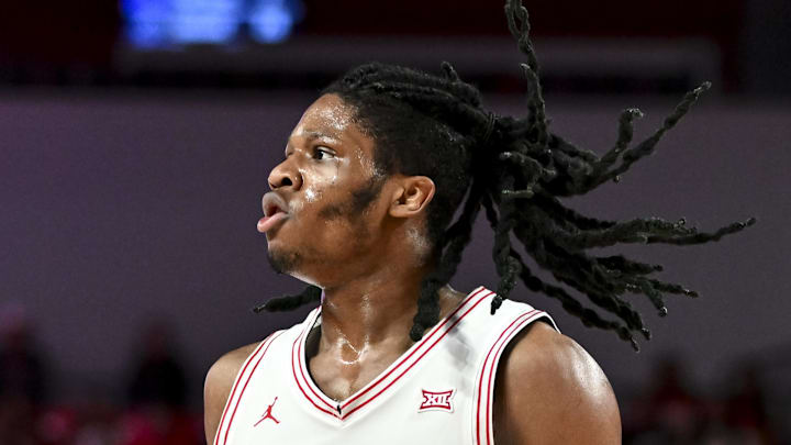 Nov 22, 2024; Houston, Texas, USA; Houston Cougars forward Joseph Tugler (11) looks on during the second half against the Hofstra Pride at Fertitta Center. Mandatory Credit: Maria Lysaker-Imagn Images 