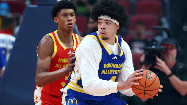 Mar 31, 2026; Glendale, AZ, USA; Tyran Stokes (4) controls the ball against Bruce Branch III (3) during the McDonalds All American Boys Game at Desert Diamond Arena. Mandatory Credit: Mark J. Rebilas-Imagn Images