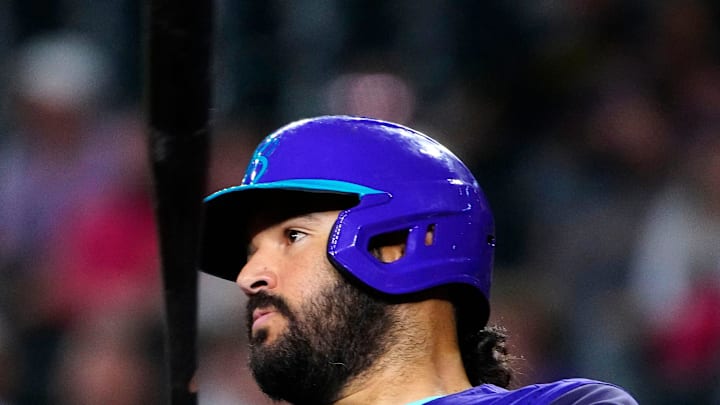 Diamondbacks infielder Eugenio Suarez (28) wears a sleeve of his family as he gets a hit against the Royals in the third inning during a game in Phoenix, at Chase Field on July 5, 2025.