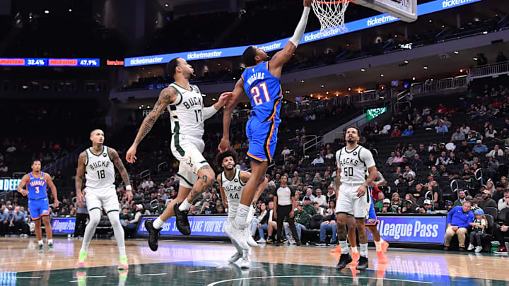 Oct 14, 2025; Milwaukee, Wisconsin, USA; Oklahoma City Thunder guard Aaron Wiggins (21) goes up for a shot against Milwaukee Bucks guard/forward Amir Coffey (17) during the second half at Fiserv Forum. Mandatory Credit: Patrick Gorski-Imagn Images Oct 14, 2025; Milwaukee, Wisconsin, USA; Oklahoma City Thunder guard Aaron Wiggins (21) goes up for a shot against Milwaukee Bucks guard/forward Amir Coffey (17) during the second half at Fiserv Forum. Mandatory Credit: Patrick Gorski-Imagn Images